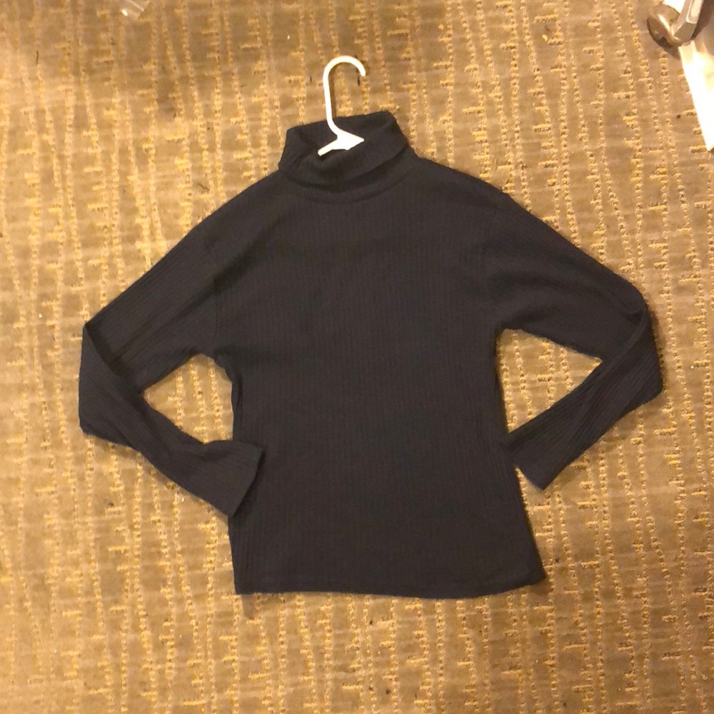 Navy blue turtle neck simple.